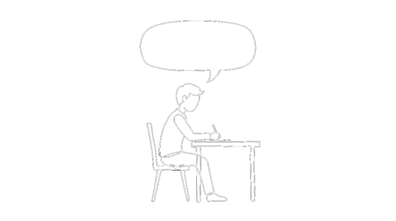 A person at a desk with an empty speech bubble
