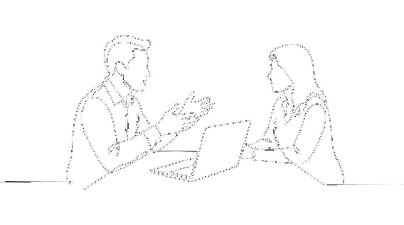 Two people talking face to face at a table